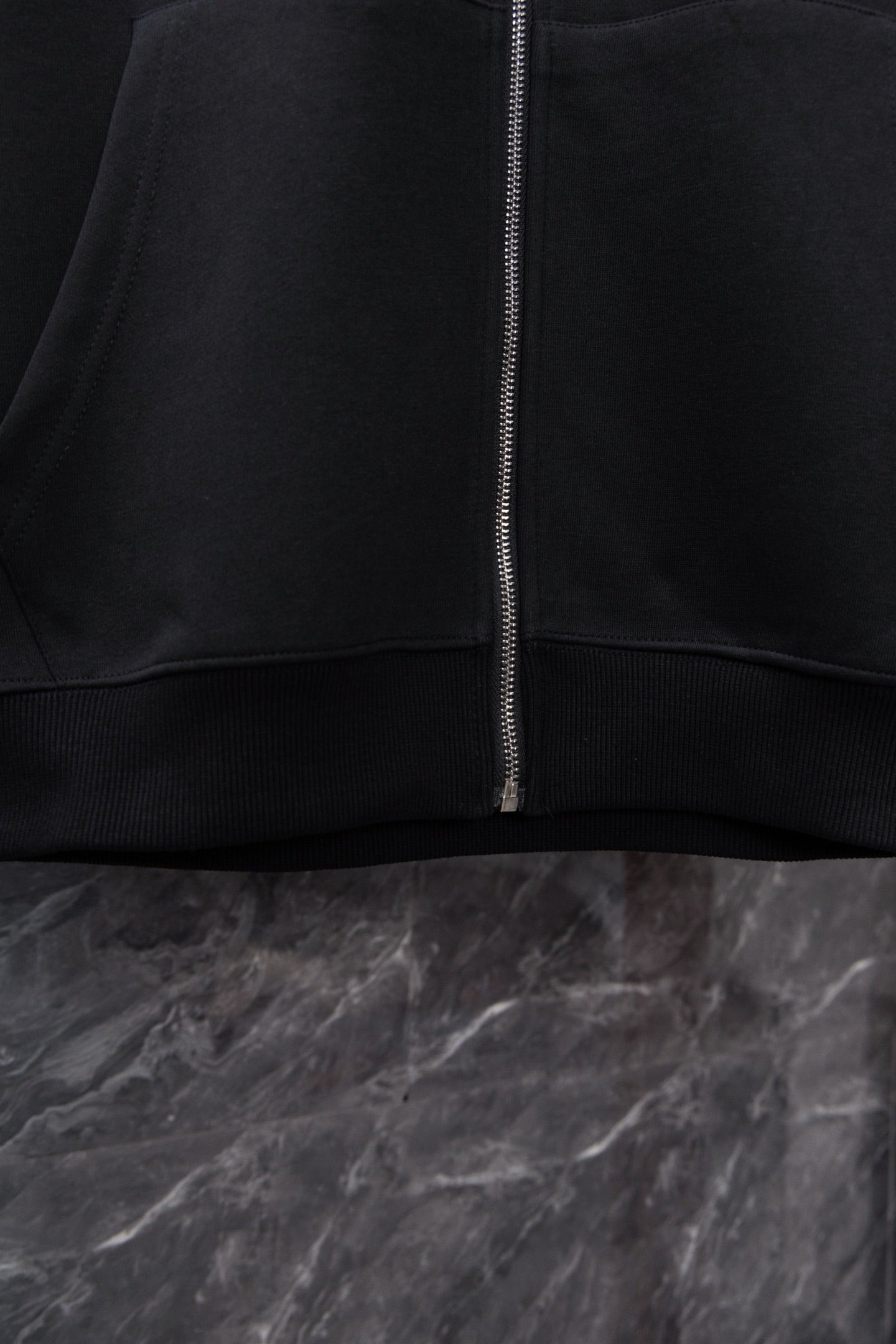 Chrome long black zip-up hoodie, full zipper and ribbed hem detail