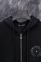 Black long zip hoodie with hood and metal zipper pull, circular chest emblem