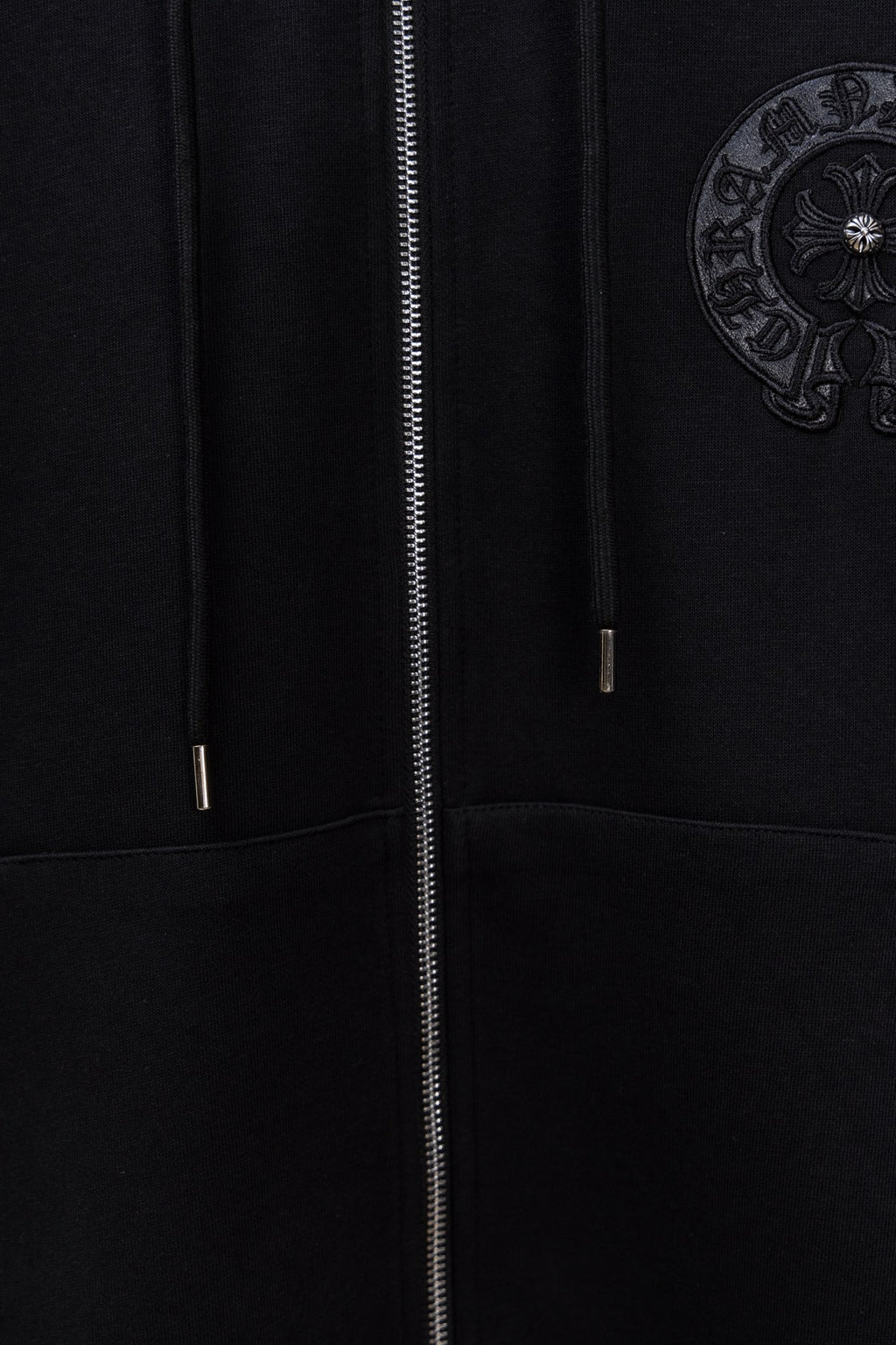 Black long zip hoodie with center zipper and two drawcord tips