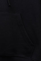 Black hoodie lower front with pocket panel and ribbed waistband