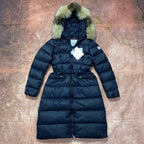 Moncler long puffer coat with green faux-fur hood, dark navy belted zip front