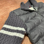 Long puffer jacket with ribbed knit stripe cuffs and gray padded front
