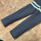 Pair of long cable-knit sleeves in dark navy with mint and white stripe