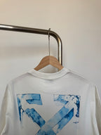 Off-white T-shirt with large blue 'X' graphic print, crew neck