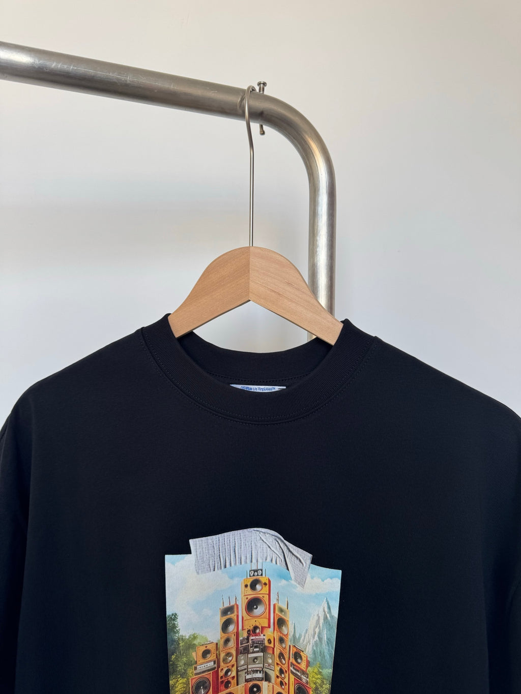 Off White T-shirt in dark color with large front logo graphic