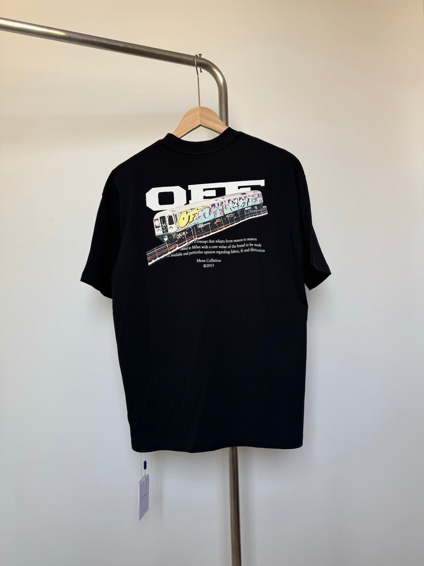 Off White T-shirt in dark color with white text and graphic print