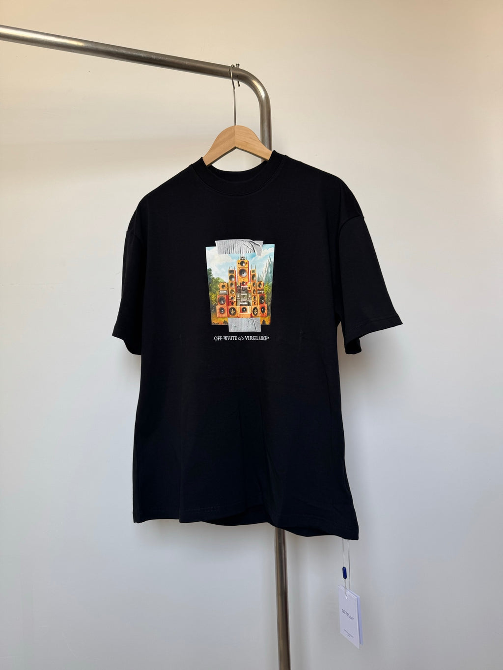 Off White T-shirt in dark color with small colorful graphic on front