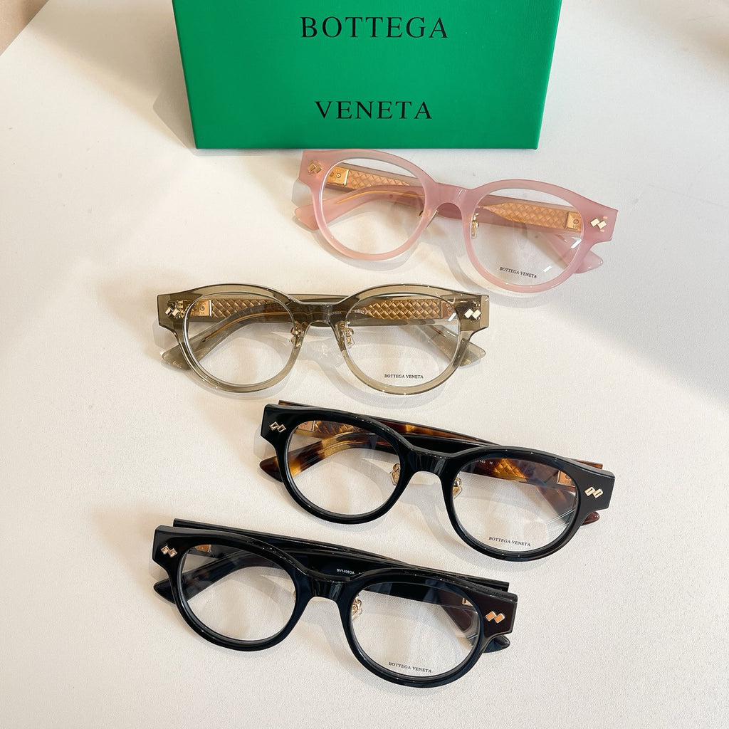 Assorted Bottega Veneta eyeglasses: pink, gold, and black frames with patterned temples