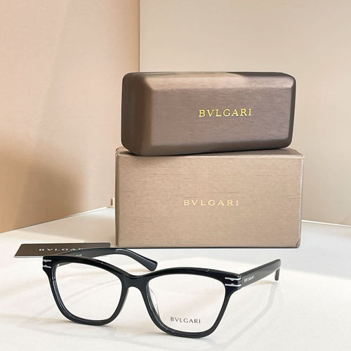 Eyeglass frames with dark acetate temples and clear lenses, BVLGARI front logo.