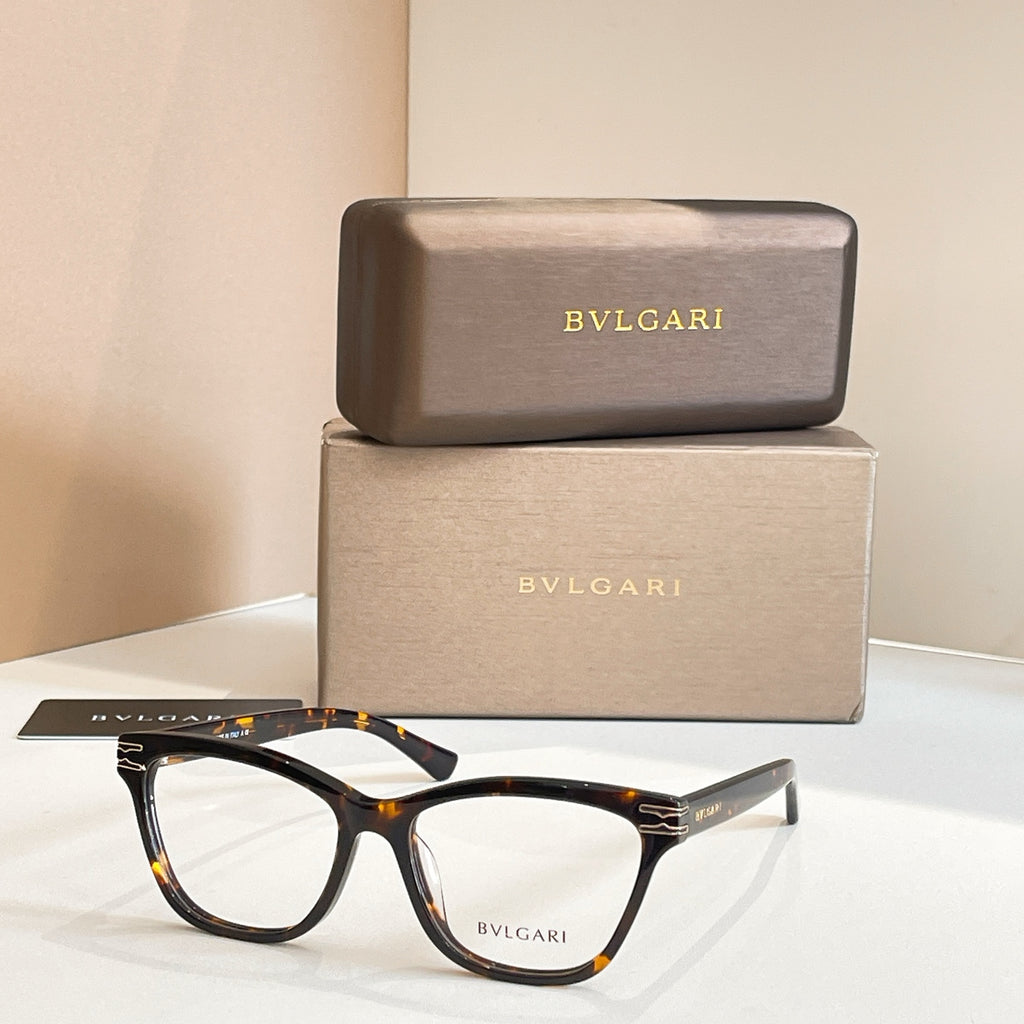 Eyeglass frames with black-and-amber acetate and clear lenses, BVLGARI front logo.