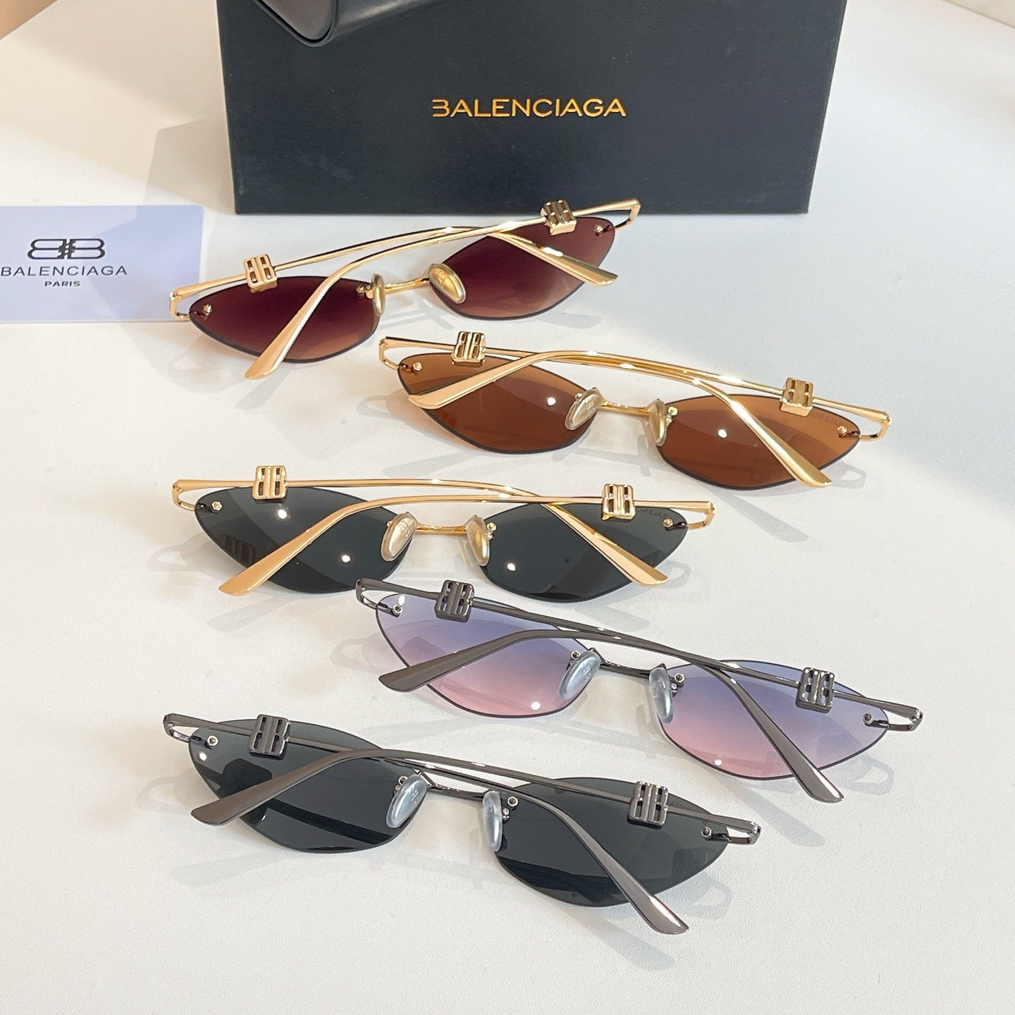 Balenciaga sunglasses assortment with mixed lens colors and gold/silver metal frames