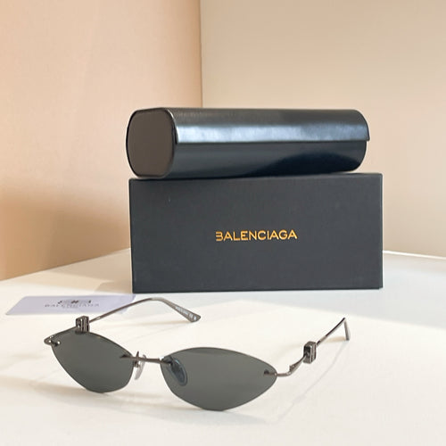 Balenciaga sunglasses with dark lenses and silver metal frame, metal temples
