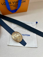 Navy leather belt with gold oval buckle on white dust bag
