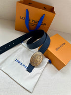 Navy leather belt with gold oval buckle, folded strap on dust bag