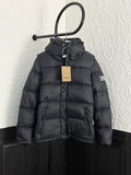Long black puffer jacket with hood, front buttons, and drawcord collar