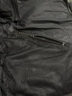 Black puffer interior with mesh pocket and zipper closure
