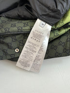 Gucci monogram long puffer jacket with size label tag and metal snap