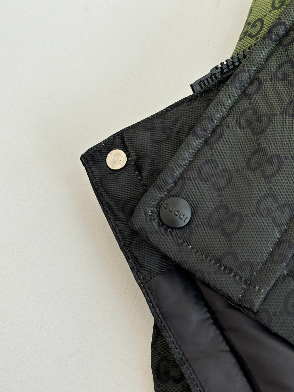 Gucci monogram long puffer jacket cuff with snap button and zipper pull