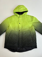 Lime green hooded puffer jacket with dark lower half and button closure