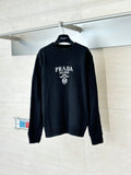Black long-sleeve crewneck sweater with PRADA MILANO crest logo