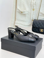 Black leather slingback heels with block heel and CHANEL logo detail