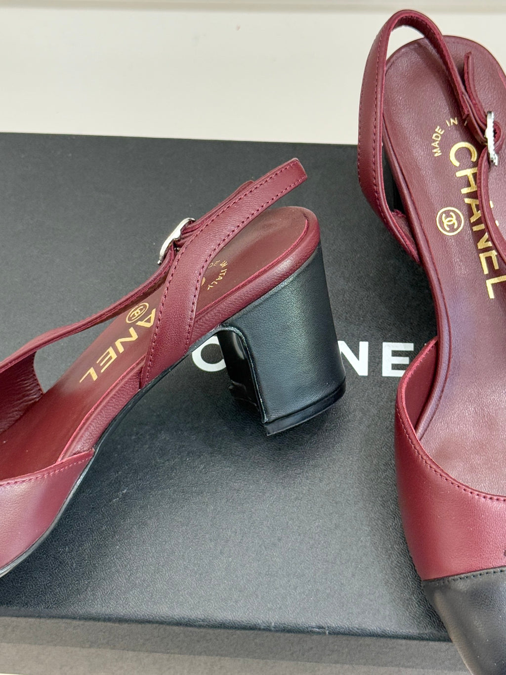 Chanel ladies slingback pumps detail, burgundy upper with black toe trim