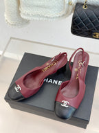Chanel ladies two-tone slingback pumps on box, burgundy leather with black toe