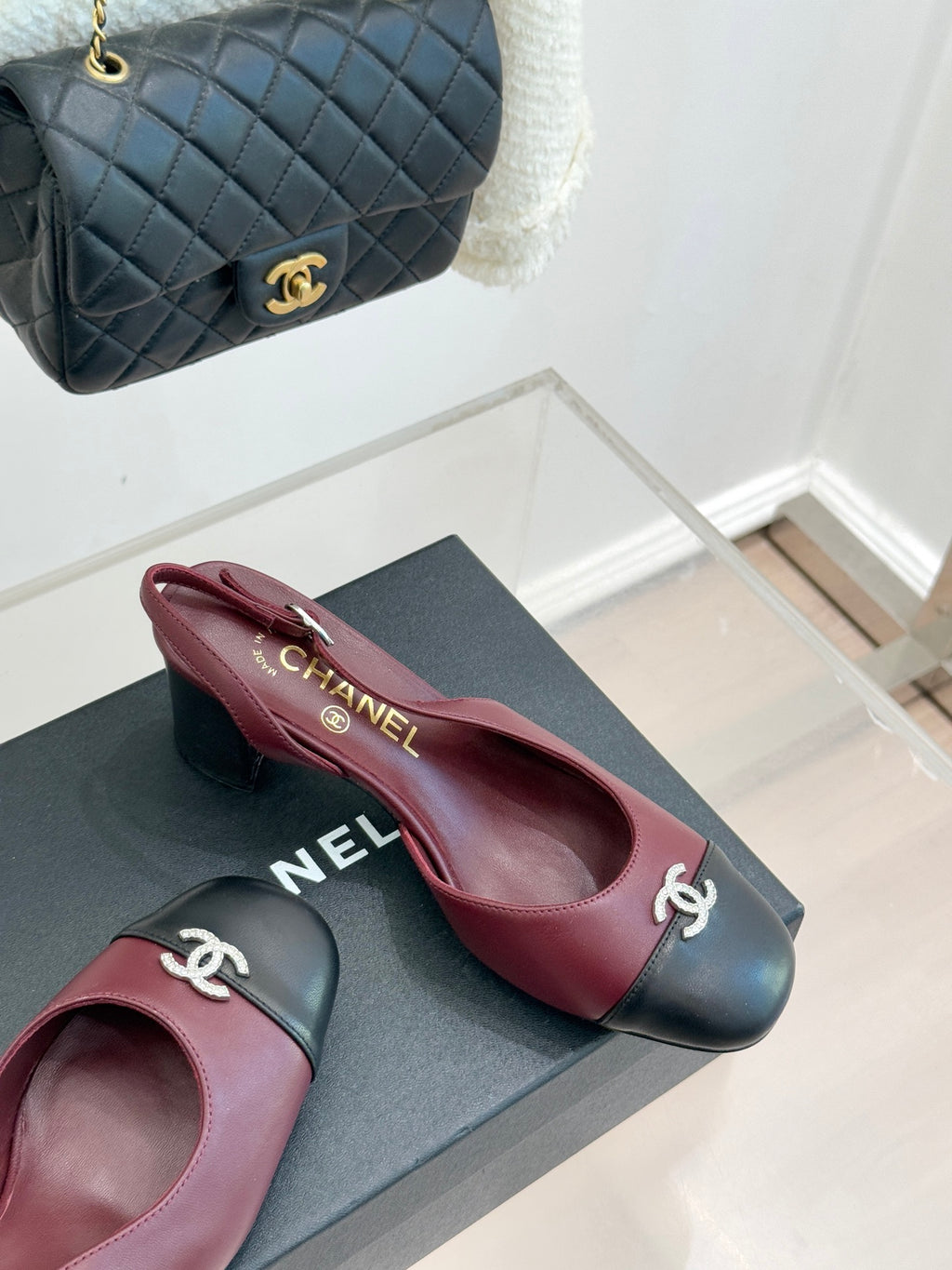 Chanel ladies two-tone slingback pumps, burgundy leather with black toe and heel