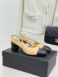Women's Chanel two-tone slingback heels, beige straps with black toe caps, block heel.