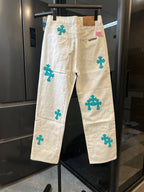 Chrome pants in white with teal cross print, back view with patch pocket