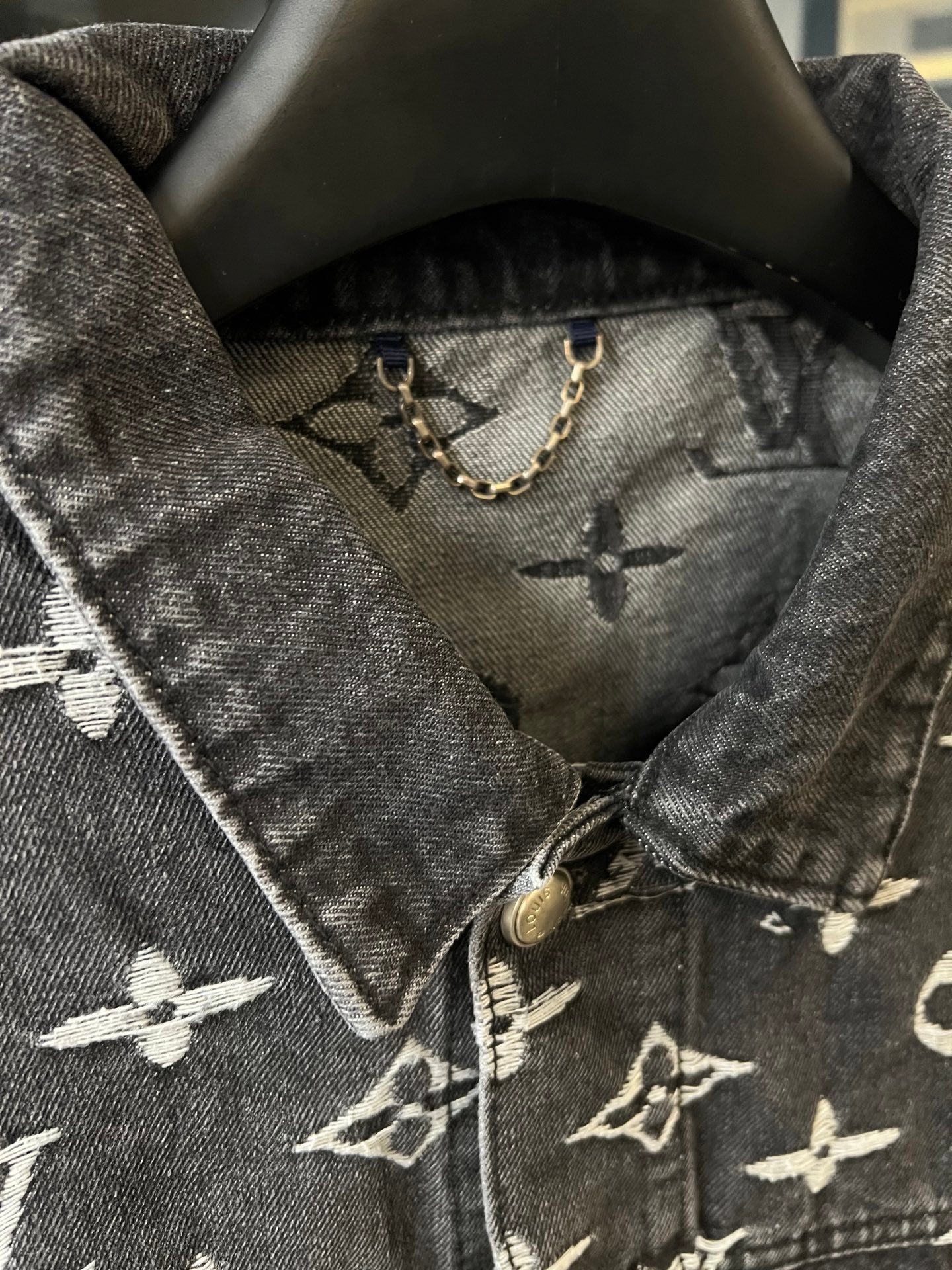 Denim jacket inner collar and top button, dark gray with cream monogram pattern