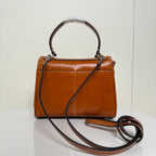 Balenciaga brown leather top-handle handbag with shoulder strap and front clasp