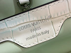 Leather authenticity tag inside reads "LOUIS VUITTON PARIS" made in Italy