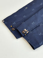 Louis Vuitton dark blue quilted jacket with monogram pattern and buttoned flap cuff