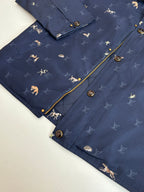 Navy Louis Vuitton jacket showing gold zipper and round metallic button accents