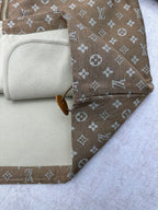 Jacket interior lining with beige fabric and zipper edge view