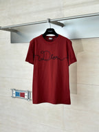 Dior red short-sleeve T-shirt with black cursive logo on chest