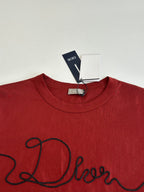 Dior red T-shirt neckline and black cursive logo detail