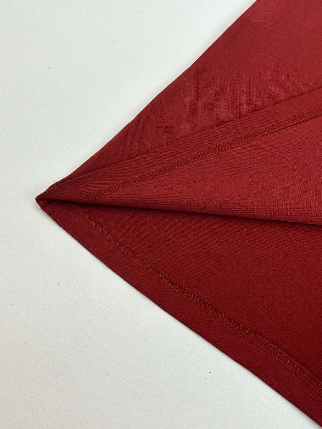 Dior red T-shirt hem and stitched edge detail