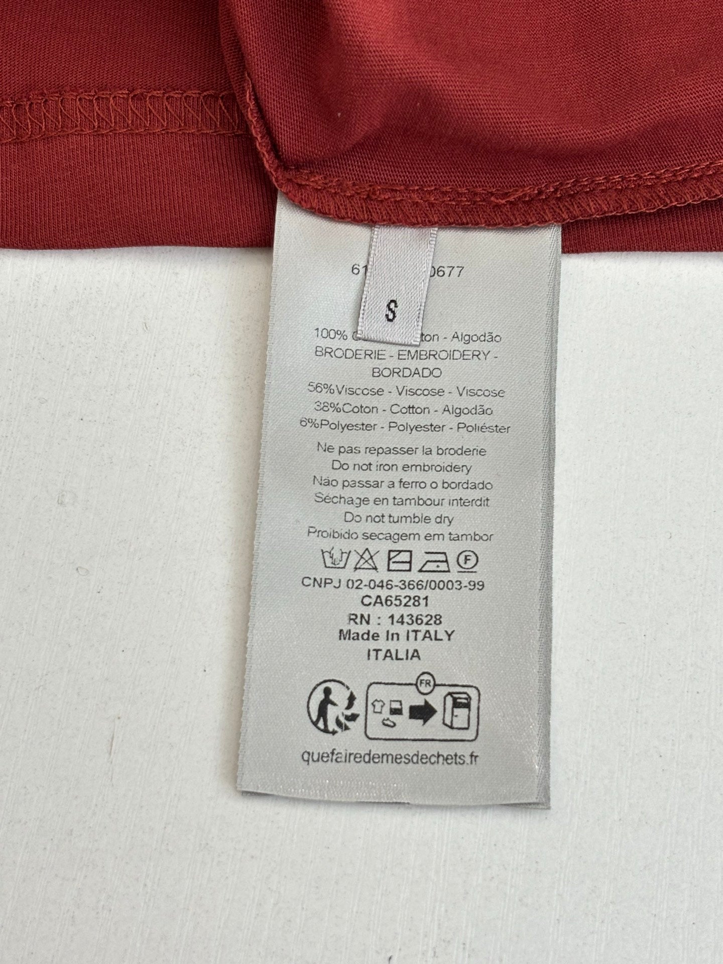 Dior T-shirt size and fabric care label on inner collar