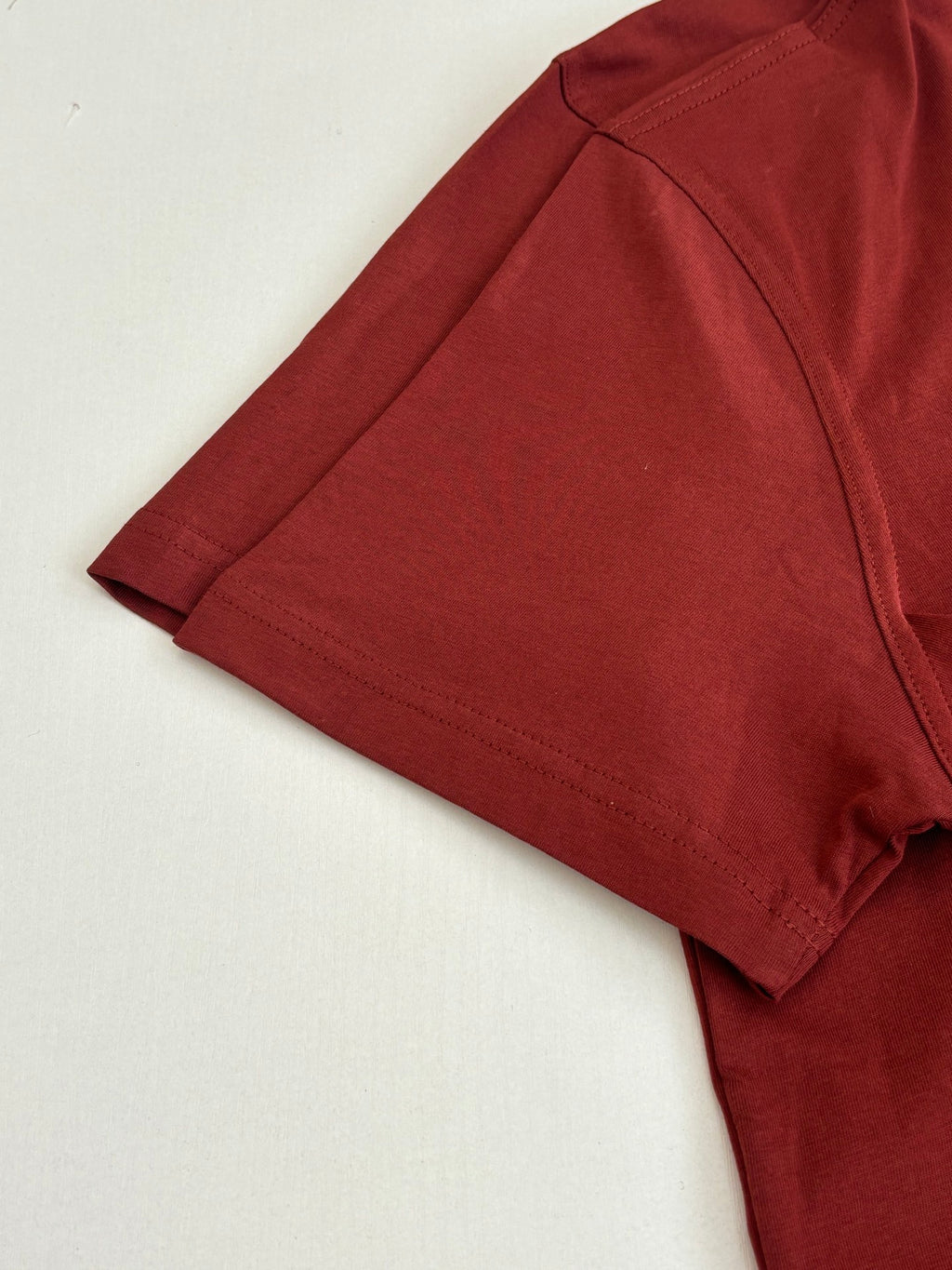 Dior red T-shirt sleeve with seam detail and stitched cuff