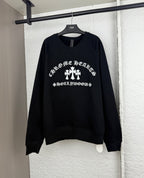 Black long-sleeve sweatshirt with white graphic logo across the chest