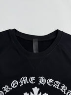 Black crewneck sweatshirt with white logo print near the neckline
