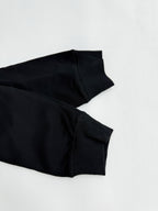 Black long-sleeve sweatshirt sleeve cuff and ribbed hem