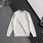 White Louis Vuitton long-sleeve crewneck sweatshirt on hanger, front view
