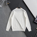 White Louis Vuitton long-sleeve crewneck sweatshirt on hanger, back view