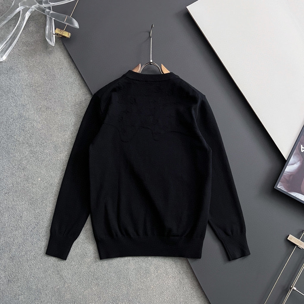 Black Louis Vuitton long-sleeve crewneck sweatshirt on hanger, back view