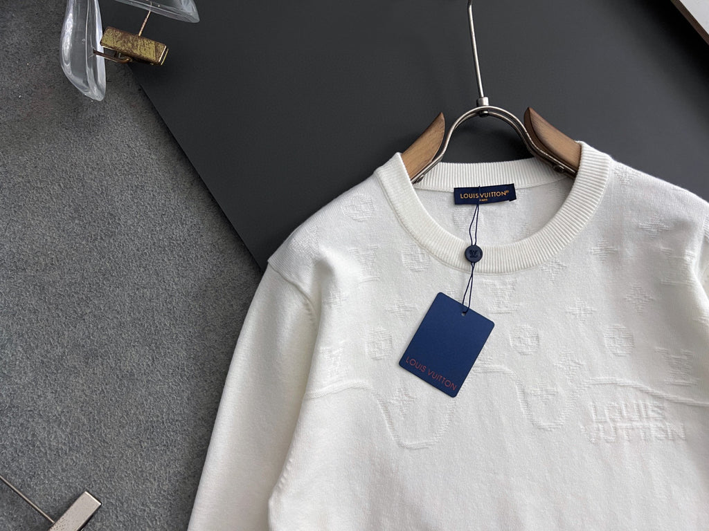 White Louis Vuitton sweatshirt with crewneck and subtle monogram pattern, front view