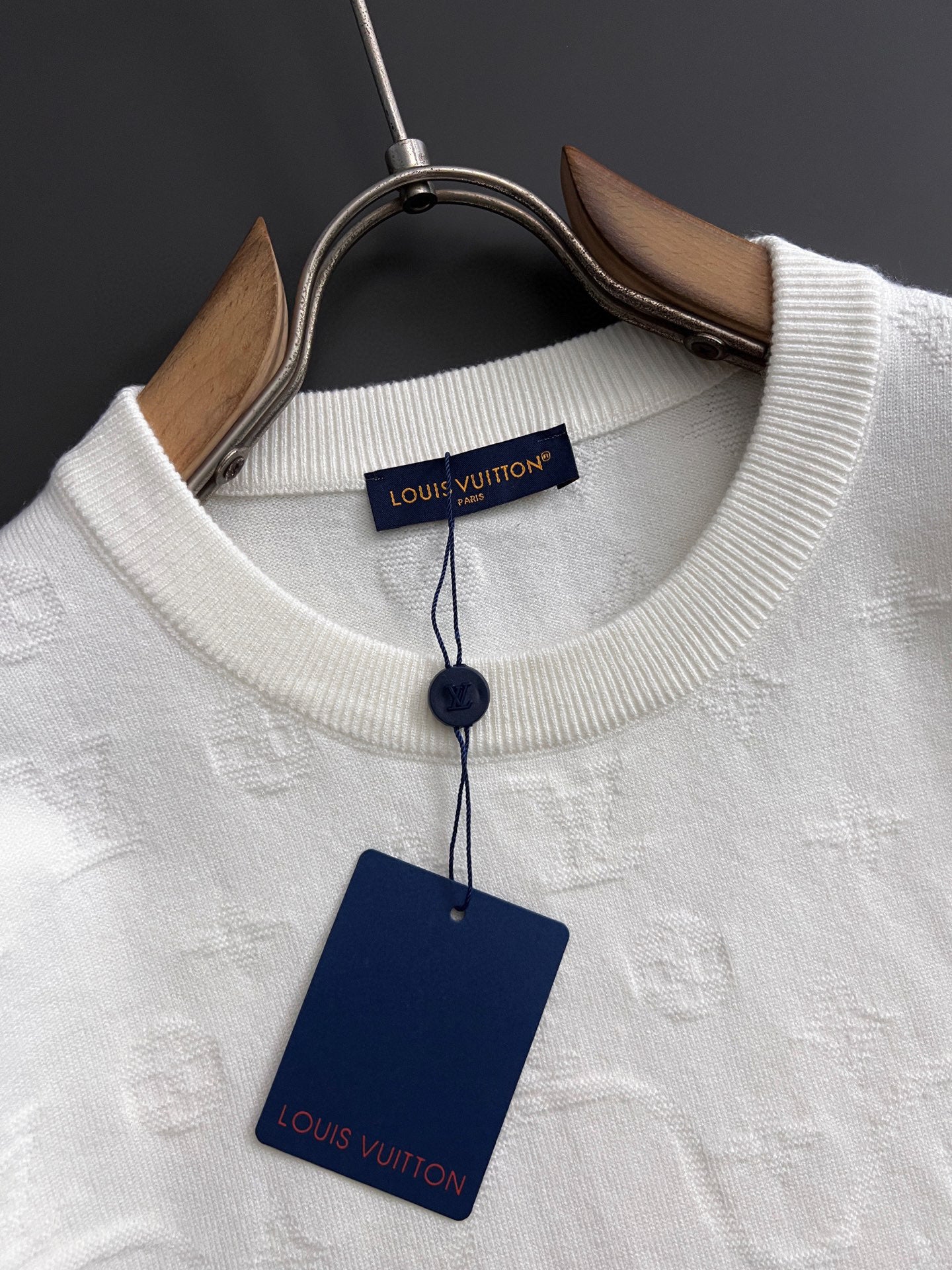 White Louis Vuitton crewneck sweatshirt with hanging tags, front detail