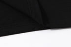 Black Off-White T-shirt fabric close-up with stitched hem detail